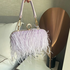 Elegant light purple feather clutch bag with crystal ring handle and gold chain strap
