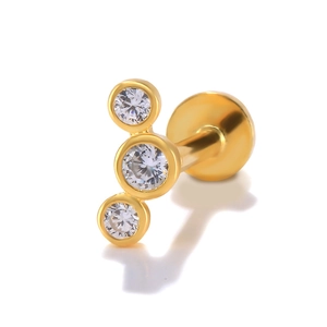Close-up of gold S925 silver piercing stud featuring three round inlaid diamonds