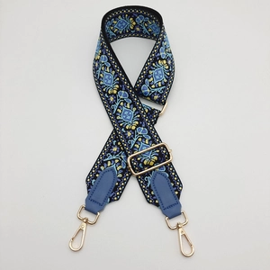 Adjustable canvas shoulder strap with vintage paisley pattern and golden metal buckles