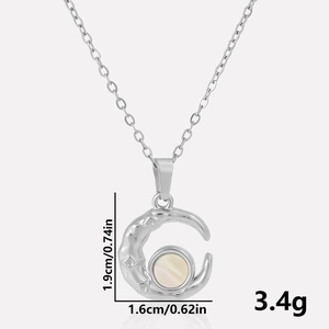 Detail of moon pendant in 304 stainless steel with white shell inlay, 1.9cm height
