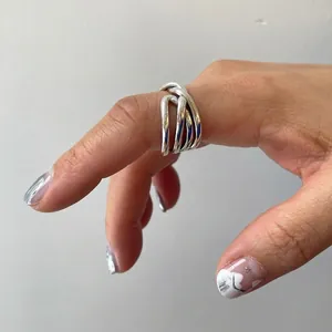 Polished S925 sterling silver multi-layer interlocking ring with irregular crossover design