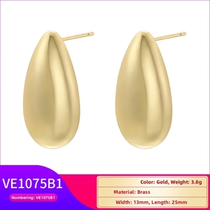 Detailed view of gold teardrop stud earrings in matte brass with dimensions and weight info