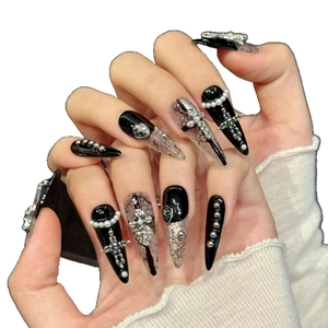 Gothic stiletto press-on nails with black lace patterns, silver crosses and pearls
