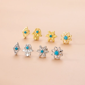 Set di orecchini vintage in acciaio con pietre turchesi in finiture oro e argento