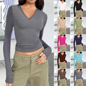 Nauwsluitende damestop met lange mouwen en V-hals, crop top in verschillende kleuren