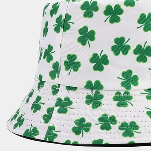 Detailed shot showing high-quality stitching and green clover pattern on a white bucket hat