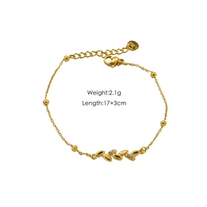 Leaf design gold bracelet with purple zircon and s.steel material details listed