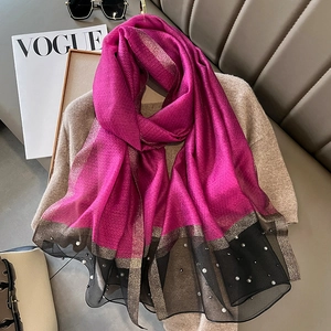 Detail of rose purple silk scarf with gold shimmer, black mesh trim and pearl accents