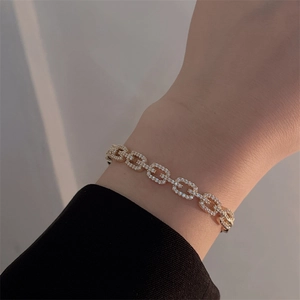 Elegant gold-plated bangle bracelet with micro-paved cubic zirconia crystals for women