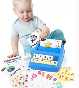 Detail showing toddler playing with alphabet letter game and educational math cards