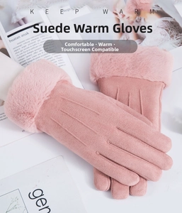 Detailed view of pink suede winter gloves featuring faux fur trim and touch screen tips