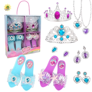 Detail of girls princess dress up set with unicorn shoes and jewelry in a gift box