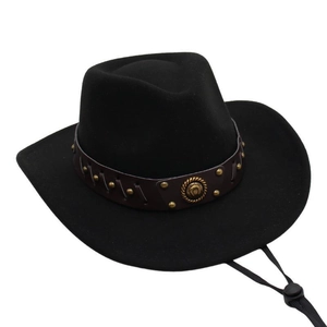 Detail of black felt cowboy hat featuring leather band with metallic studs and buckle