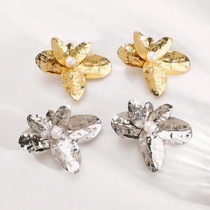 Statement irregular oversized flower earrings with hammered metal texture and center pearl