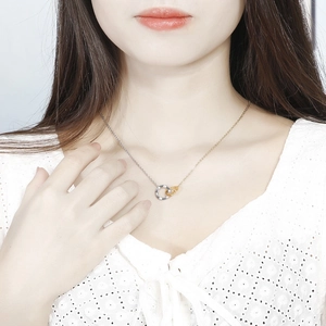 Minimalist interlocking double ring necklace with two-tone gold and silver chain for women