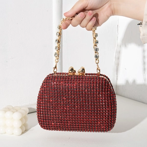 Elegant red rhinestone evening clutch bag with golden chain handle and heart-shaped lock