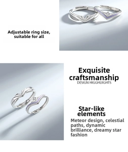 Macro detail of adjustable V-shaped silver couple rings with purple accents and zircon