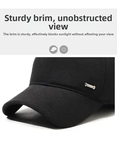 Close-up of firm baseball cap brim and metal side buckle in black textured wool