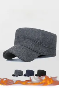 Close-up of thick wool flat top cap featuring warm fleece lining and reinforced stitching