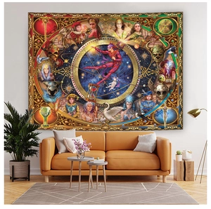 Artistic detail of astrology tapestry featuring zodiac signs over an orange sofa