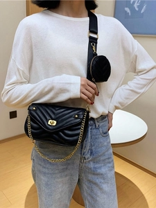 Chic black V-quilted crossbody bag with gold chain and round coin purse for women