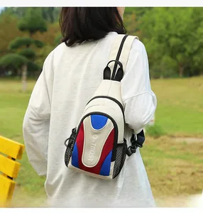 Detail of multi-color oxford sling bag with side mesh pocket and adjustable shoulder strap
