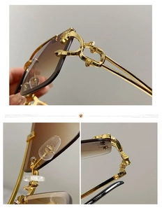 Detail of the golden metal hinge and silicone nose pads on stylish gradient sunglasses