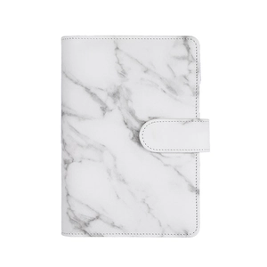 Close-up of white marble pattern PU leather notebook cover with magnetic buckle