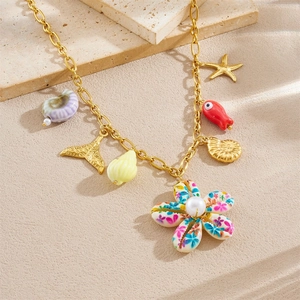 Golden stainless steel necklace featuring sea shells, starfish, and a pearl flower pendant
