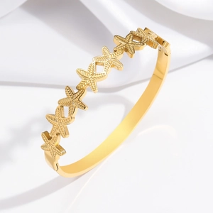 Elegant gold starfish open bangle bracelet in polished stainless steel for women