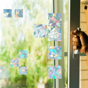 Rainbow prism static window film with geometric patterns showing colorful laser reflection