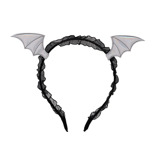 Close-up of black lace and silver glitter bat wing headband for Halloween party hair décor