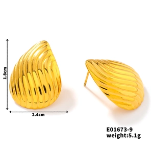 Detailed view of golden teardrop earrings showing 1.8cm height and 2.4cm width dimensions