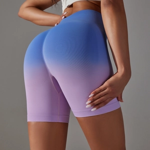 Rear view of seamless high-waisted yoga shorts with blue to purple gradient and ribbed band