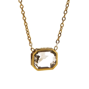 Minimalist gold chain necklace featuring an octagonal emerald-cut clear crystal pendant