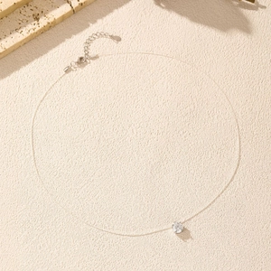 Sparkling 1ct Moissanite round cut pendant on minimalist invisible fishing line necklace