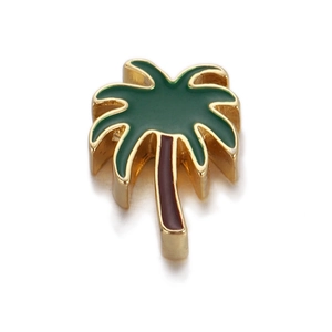 Detail of tropical palm tree pendant with green enamel and gold finish for DIY jewelry
