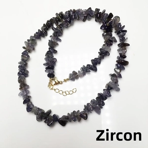 Detailed view of natural iolite chip bead necklace with a gold-plated lobster clasp