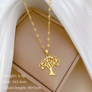 Macro view of gold tree of life pendant with crystals and detailed sizing parameters
