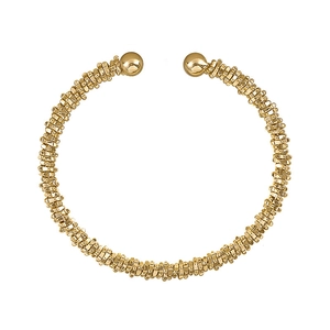 Minimalist gold spiral open cuff bracelet with polished spherical ends in a sleek metal design