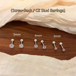 Minimalist 925 silver stud earrings set with zircon and screw back closure
