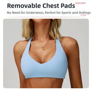 Close-up of light blue halter sports bra with functional removable chest pads