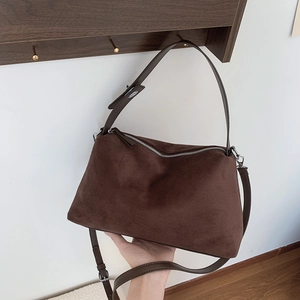 Vintage dark brown suede hobo bag with adjustable strap and metal hardware
