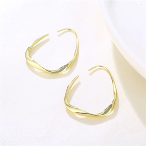 Polished gold irregular twisted hoop earrings featuring a minimalist drop design for women
