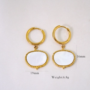 Detail showing 19mm by 16mm dimensions and 6.8g weight of gold white shell earrings