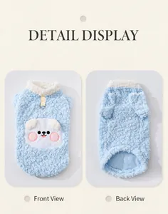Detail showing the blue fleece pet vest with white bear embroidery and metal D-ring