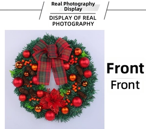 Close-up of Christmas wreath featuring red plaid bow, pine cones and red berries