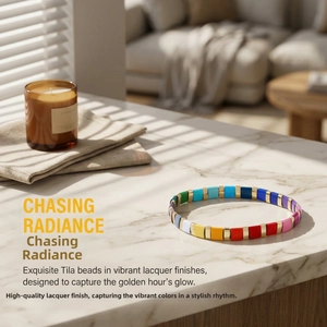 Close-up of colorful Tila bead bracelets on marble surface with soft shadow lighting