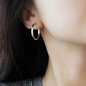 French style minimalist S925 sterling silver hoop earrings worn by a model
