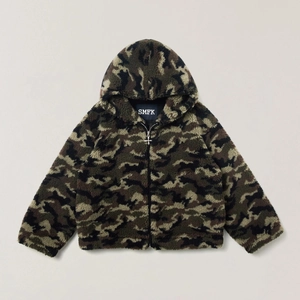 Close-up of textured camouflage faux fur hoodie with high-quality zipper and plush finish